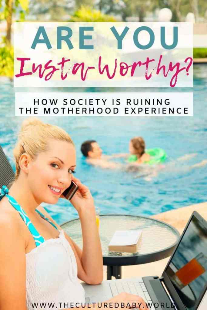 mom talking on the phone by the computer while her husband and child is playing in the pool.