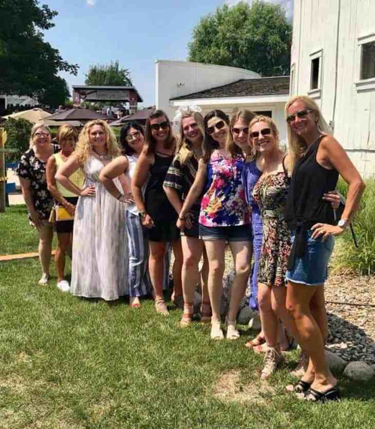 mom friends standing together