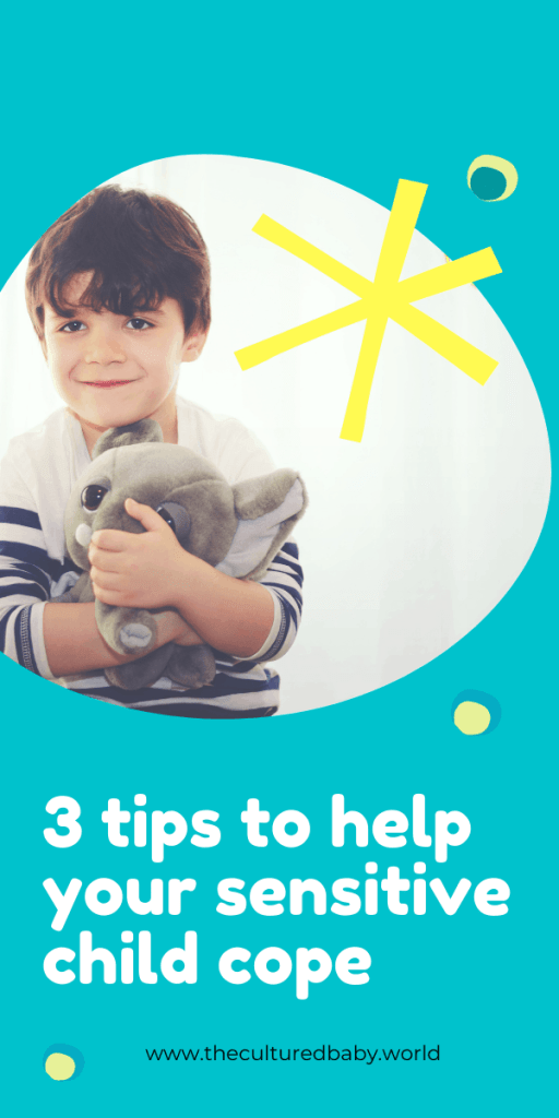 small boy cuddling a stuffed animal