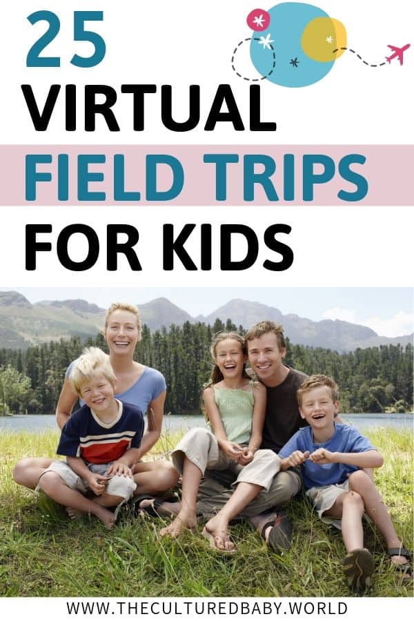 family sitting together smiling with mountains and trees in background